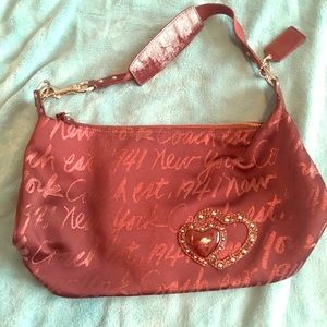 Wine colored Coach with summer detail